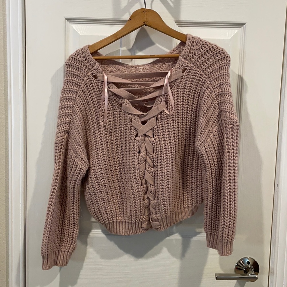 Pink knitted sweater